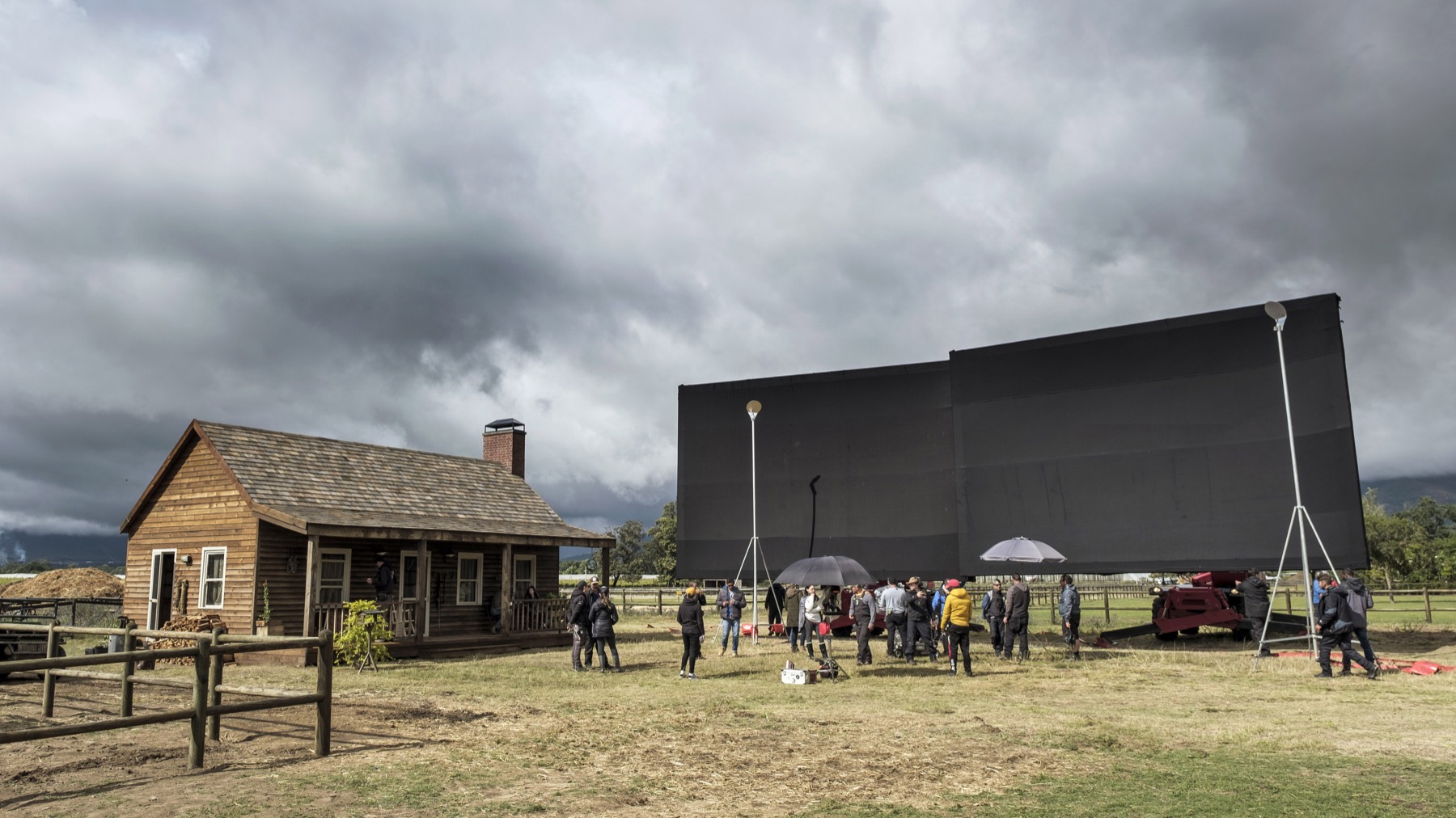 The Black Beauty crew controlling natural light on the farm set